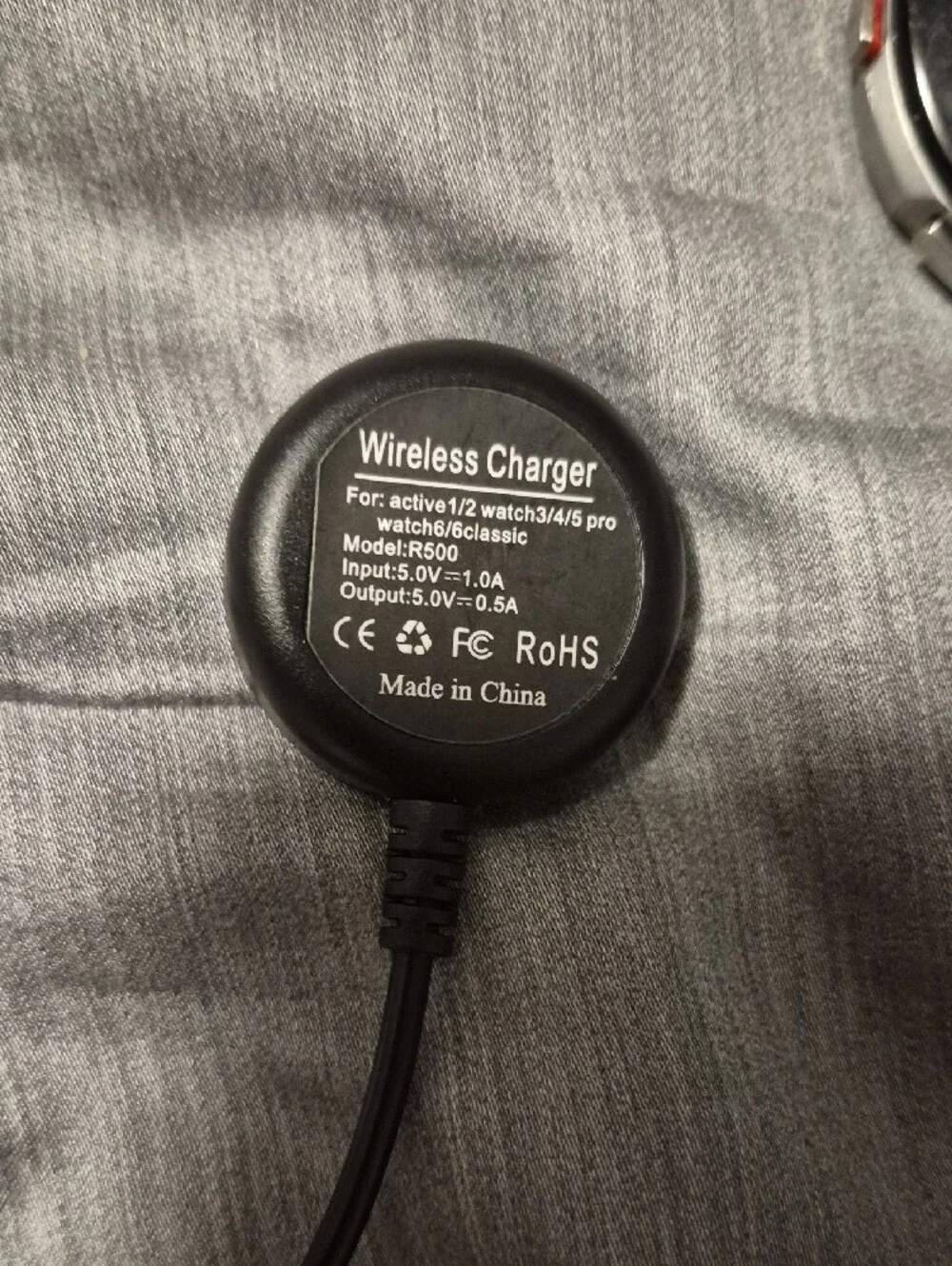 Samsung GALAXY Watch 4 Classic With Silver Shell, Velcro Wristband, and Charger